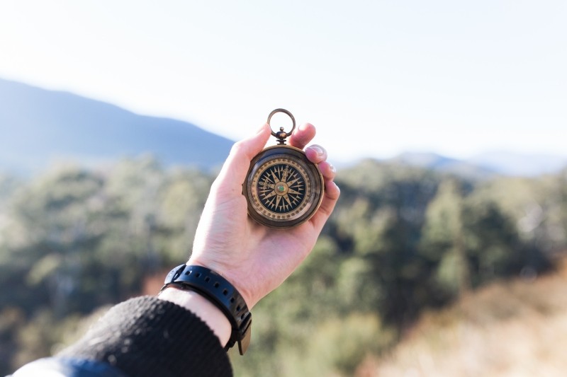 compass-person-hand